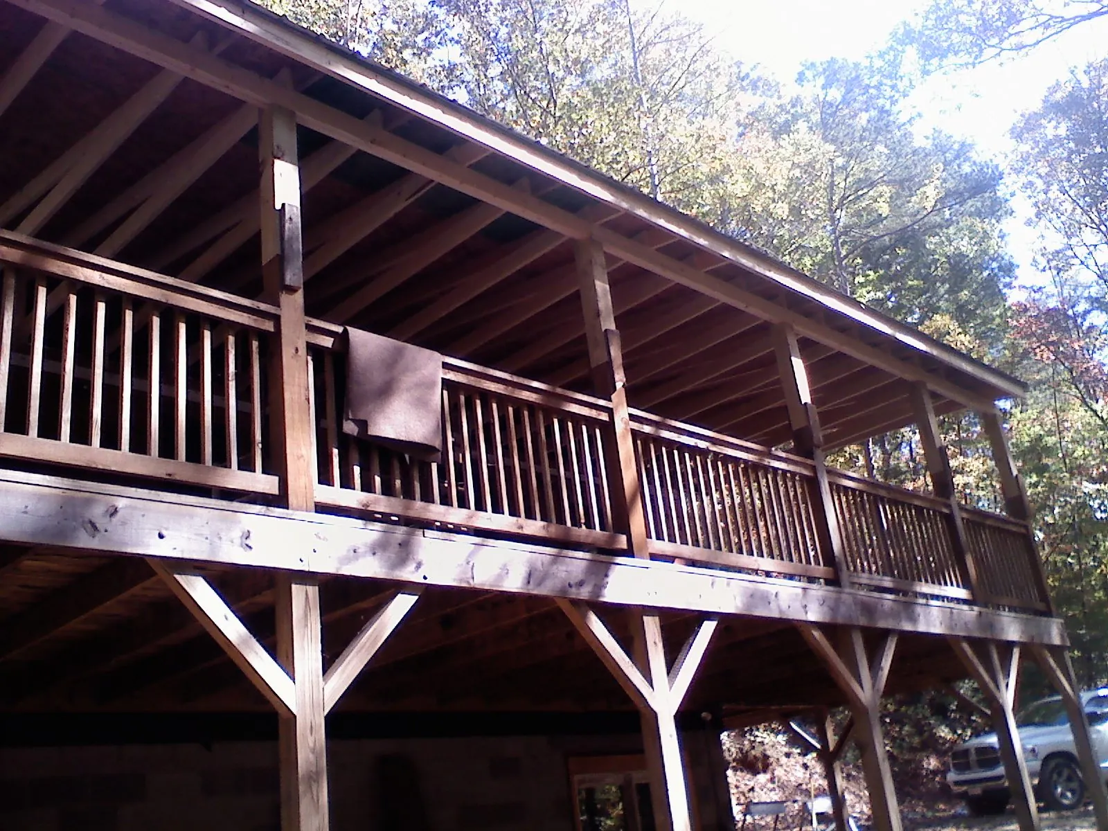 Timber framing under a new elevated porch and deck — Roof Leak Repair in Ludlow by Roofing Brothers